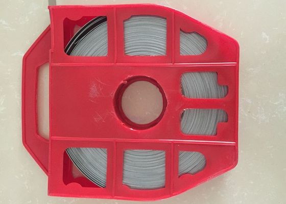 China Acero de alta resistencia a la tracción que ata con correa la correa, correa de las bandas del metal con el dispensador plástico rojo proveedor